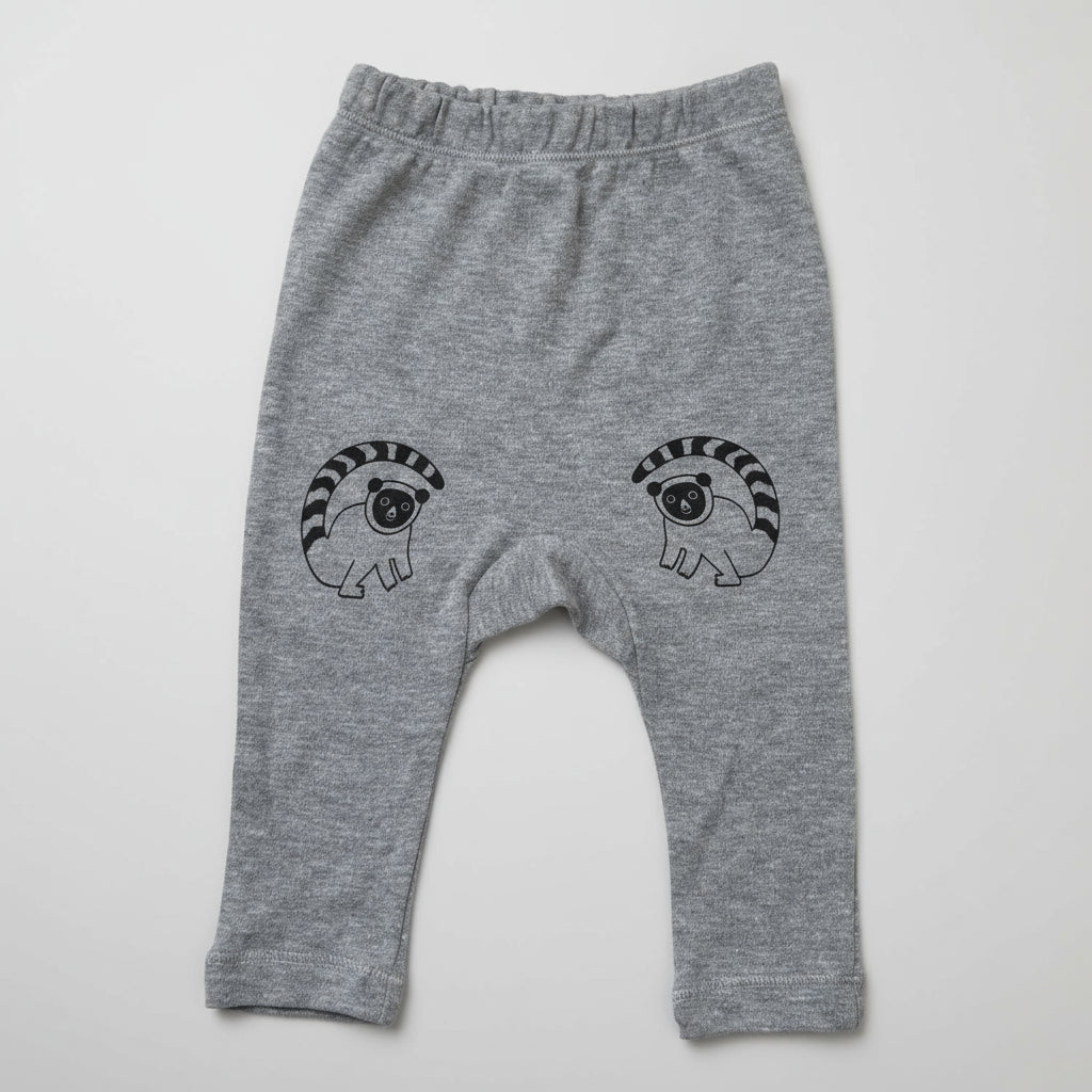 Grey organic cotton baby leggings with black lemur design front view