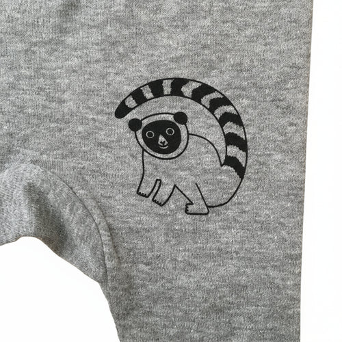 Grey organic cotton baby leggings with black lemur design front view close up detail